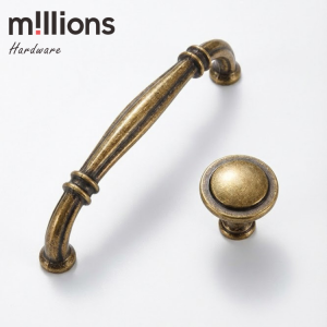 1997 antique brass cabinet handle and round knob set